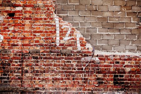 simsearch:400-06094397,k - A brick and concrete wall with texture Photographie de stock - Aubaine LD & Abonnement, Code: 400-05169297
