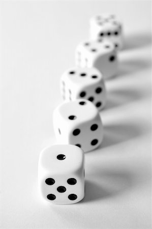 symbols dice - five dices in line out of focus Stock Photo - Budget Royalty-Free & Subscription, Code: 400-05169545