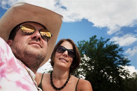 Happy Adult Couple Outside on Cloudy Day Stock Photo - Budget Royalty-Free & Subscription, Code: 400-05169903