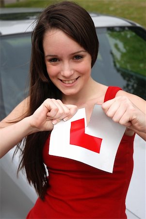 Happy teenager who has just passed her driving test Stock Photo - Budget Royalty-Free & Subscription, Code: 400-05160131