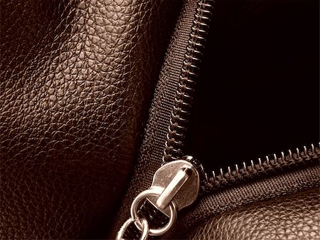 sepia toned leather swatch with metal zipper closeup fragment Foto de stock - Super Valor sin royalties y Suscripción, Código: 400-05160499