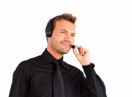 simsearch:400-04129170,k - Attractive businessman working with a headset on Fotografie stock - Microstock e Abbonamento, Codice: 400-05160643