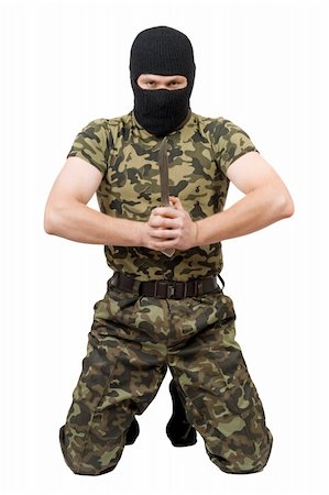 simsearch:400-07779478,k - The man with a knife in a black mask over white Stock Photo - Budget Royalty-Free & Subscription, Code: 400-05160668