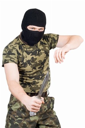 simsearch:400-07779478,k - The criminal with a knife in a black mask over white Stock Photo - Budget Royalty-Free & Subscription, Code: 400-05160669