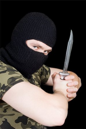 simsearch:400-07779478,k - The criminal with a knife in a black mask Stock Photo - Budget Royalty-Free & Subscription, Code: 400-05160679