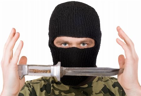 simsearch:400-07779478,k - The man with a knife in a black mask. Isolated Stock Photo - Budget Royalty-Free & Subscription, Code: 400-05160670