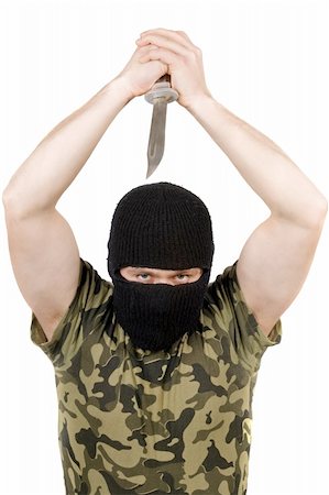 simsearch:400-07779478,k - The killer with a knife in a black mask over white Stock Photo - Budget Royalty-Free & Subscription, Code: 400-05160672