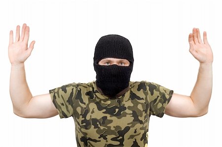 The surrendered criminal in a black mask over white Stock Photo - Budget Royalty-Free & Subscription, Code: 400-05160673