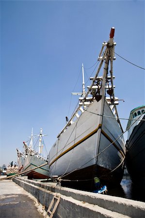 Makassar schooners (pinisi) in Sunda Kelapa Stock Photo - Budget Royalty-Free & Subscription, Code: 400-05161177