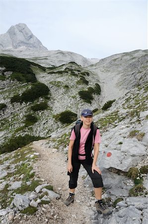 rock climbing with rucksack - Female hiker in the alps. Stock Photo - Budget Royalty-Free & Subscription, Code: 400-05161270