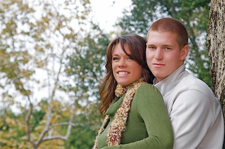 simsearch:400-05911333,k - Young couple in an autumn forest picnic area Fotografie stock - Microstock e Abbonamento, Codice: 400-05161298