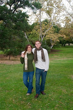 simsearch:400-05911333,k - Young couple in an autumn forest picnic area Fotografie stock - Microstock e Abbonamento, Codice: 400-05161299
