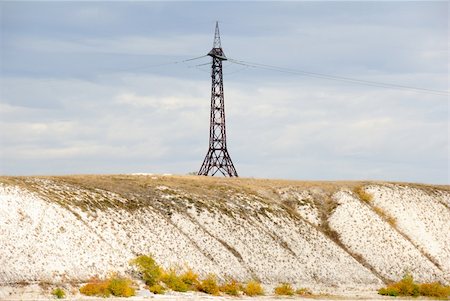simsearch:400-09274553,k - High voltage line and electricity pylon on cretaceous mountains on a coastaline of the river Don. Russia. Stock Photo - Budget Royalty-Free & Subscription, Code: 400-05161346
