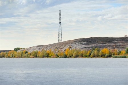 simsearch:400-09274553,k - High voltage line and electricity pylon on cretaceous mountains on a coastaline of the river Don. Russia. Stock Photo - Budget Royalty-Free & Subscription, Code: 400-05161348