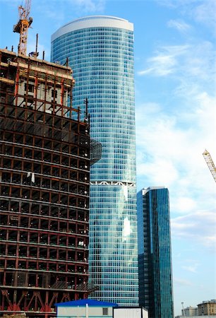 simsearch:400-04573514,k - Construction of skyscrapers from glass, a steel and concrete of a complex of the international business centre Moscow-city, Moscow, Russia Foto de stock - Royalty-Free Super Valor e Assinatura, Número: 400-05161356