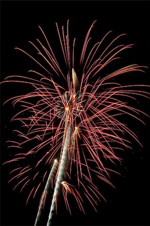 rocket flames - Beautiful fireworks fill the night time sky Photographie de stock - Aubaine LD & Abonnement, Code: 400-05161539