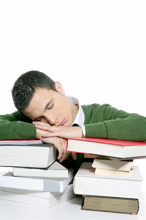 boy student sleeping over stack books over desk, green shirt and tie Stock Photo - Budget Royalty-Free & Subscription, Code: 400-05162656