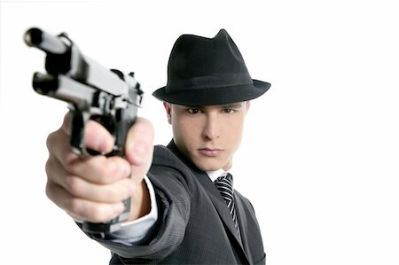 simsearch:400-05201934,k - Classic mafia portrait, man with black suit and gun, isolated on white Photographie de stock - Aubaine LD & Abonnement, Code: 400-05162666