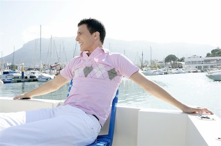 Young handsome man relaxed in vacation with his boat Stock Photo - Budget Royalty-Free & Subscription, Code: 400-05162676