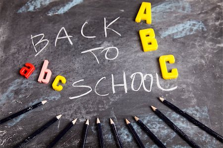 Inscription on a school chalkboard - back to school Stock Photo - Budget Royalty-Free & Subscription, Code: 400-05162779