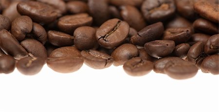 simsearch:400-05112254,k - Heap of grains of coffee. It is isolated on a white background Stockbilder - Microstock & Abonnement, Bildnummer: 400-05162880