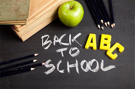 Inscription on a school chalkboard - back to school Stock Photo - Budget Royalty-Free & Subscription, Code: 400-05162988