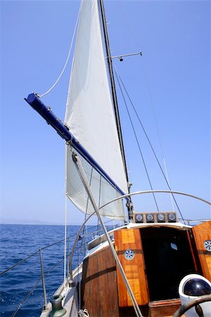 simsearch:400-09237900,k - Sailing with an old sailboat over blue mediterranean summer sea Foto de stock - Super Valor sin royalties y Suscripción, Código: 400-05163828