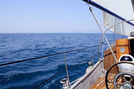 simsearch:400-09237900,k - Sailing with an old sailboat over blue mediterranean summer sea Foto de stock - Super Valor sin royalties y Suscripción, Código: 400-05163829