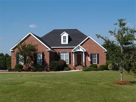 One story new red brick residential home. Stock Photo - Budget Royalty-Free & Subscription, Code: 400-05174077