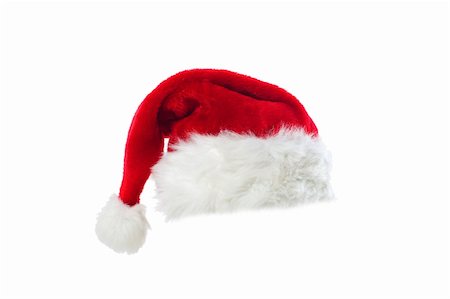 simsearch:400-05701397,k - Santa's red hat isolated over white background Fotografie stock - Microstock e Abbonamento, Codice: 400-05174355