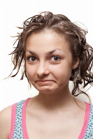 simsearch:400-04622088,k - Young girl with wet hair and colour towel on neck, make faces Stock Photo - Budget Royalty-Free & Subscription, Code: 400-05174396