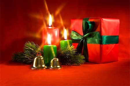 simsearch:400-04272073,k - Burning xmas candle, little gift box and golden hand bells. Christmas decorations of the cross filter effect Foto de stock - Super Valor sin royalties y Suscripción, Código: 400-05174819