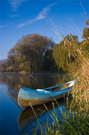 Blue canoe on the river Stock Photo - Budget Royalty-Free & Subscription, Code: 400-05175878