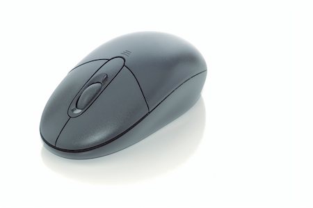 A black computer mouse isolated on white with clipping path Foto de stock - Super Valor sin royalties y Suscripción, Código: 400-05176593