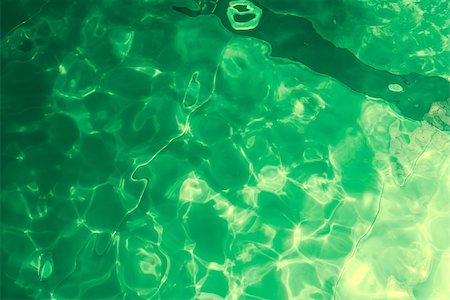 simsearch:400-07622541,k - Rippling shiny liquid in green tone Stock Photo - Budget Royalty-Free & Subscription, Code: 400-05176924