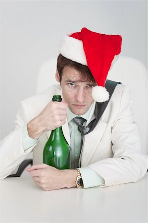 The young man celebrates Christmas at office Stock Photo - Budget Royalty-Free & Subscription, Code: 400-05177552