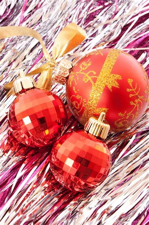 simsearch:400-05177572,k - Red Christmas balls among silver glittering decoration Stock Photo - Budget Royalty-Free & Subscription, Code: 400-05177567
