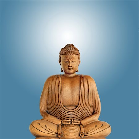 simsearch:400-05154191,k - Buddha  in meditation, over blue background with white central glow. Stock Photo - Budget Royalty-Free & Subscription, Code: 400-05178030