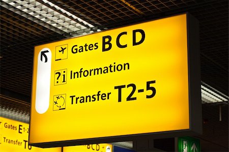 Information sign in airport. Gates and transfer directions Foto de stock - Super Valor sin royalties y Suscripción, Código: 400-05178146