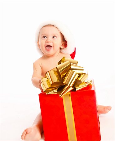 Baby boy sitting with Christmas present Stock Photo - Budget Royalty-Free & Subscription, Code: 400-05178609