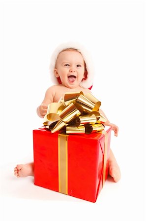 Baby boy sitting with Christmas present Stock Photo - Budget Royalty-Free & Subscription, Code: 400-05178614