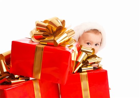 simsearch:400-06557484,k - Baby boy peeping out from  Christmas presents Stockbilder - Microstock & Abonnement, Bildnummer: 400-05178610