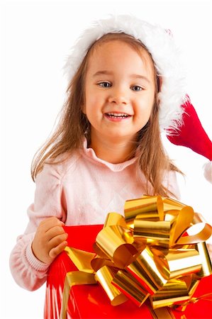 decorating small xmas tree - Lovely preschool girl carrying a large present box Stock Photo - Budget Royalty-Free & Subscription, Code: 400-05178637