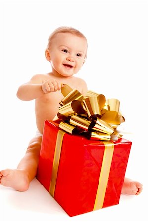 happy boy with Xmas present Stock Photo - Budget Royalty-Free & Subscription, Code: 400-05178640