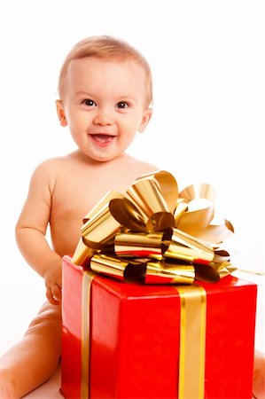 Little boy with Xmas present Stock Photo - Budget Royalty-Free & Subscription, Code: 400-05178641