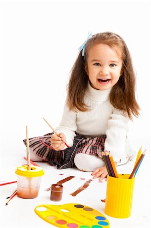 Preschool girl painting a picture Foto de stock - Super Valor sin royalties y Suscripción, Código: 400-05178643