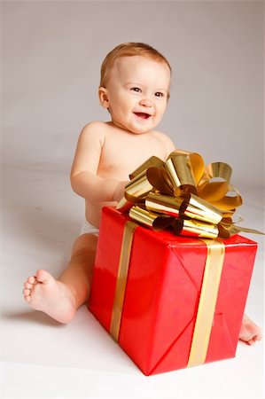 Little boy with Xmas present Stock Photo - Budget Royalty-Free & Subscription, Code: 400-05178650