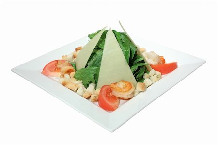 Caesar salad with fried shrimps and triangular slices of parmesan. Isolated on white. Stock Photo - Budget Royalty-Free & Subscription, Code: 400-05178894