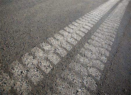 street crack - Tracks from a truck on black asphalt Stock Photo - Budget Royalty-Free & Subscription, Code: 400-05178947