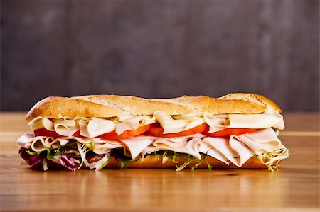 Turkey sandwich with cheese lettuce and tomato Stock Photo - Budget Royalty-Free & Subscription, Code: 400-05178986
